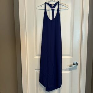 Wilfred racer back dress with slits at the bottom on both sides.